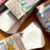 Geöffnete SlipFlip Slipeinlagen Verpackungen mit Slipeinlagen